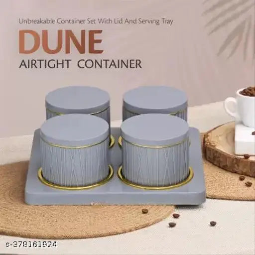 The image shows a set of four bluish grey storage containers, airtight as indicated by the packaging