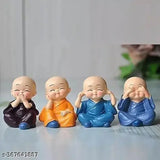 Multicolor resin mini Buddha monk idol statues for home decor, set of 4 pieces on table top or car dashboard