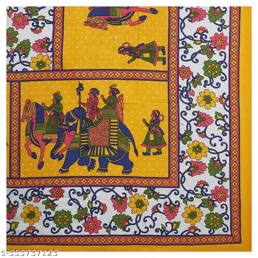 Yellow cotton Jaipuri bedsheet with elephant and floral design.