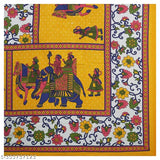 Yellow cotton Jaipuri bedsheet with elephant and floral design.