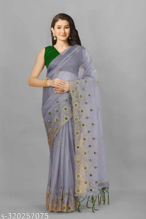 Embroidered feather design mirror work sari in super net fabric, features heavy plain banglory silk blouse with cutwork border and pallu size latkan. Colors: mustard yellow, off white, black, steel gray, sky blue. Free Size (Saree length: 5.5m, Blouse length: 0.8m). Made in India