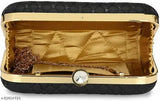 Black leather clutch, gold chain, flap closure