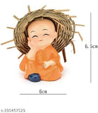 Multicolor resin baby Buddha statues, 4 pieces, intricate Indian craftsmanship, ideal for home or car decor