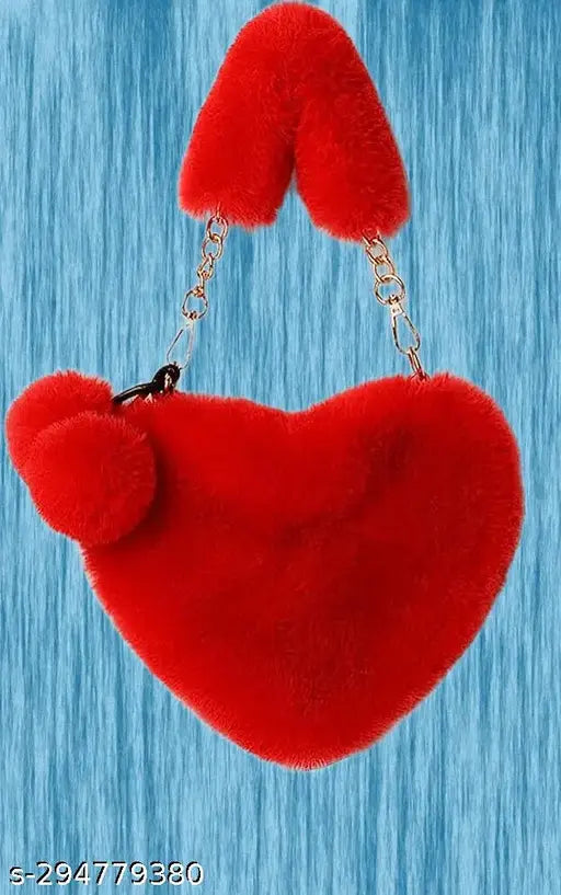 Red heart-shaped faux fur handbag, designed for women. Soft fur material, embellished with pom poms and pom pom balls