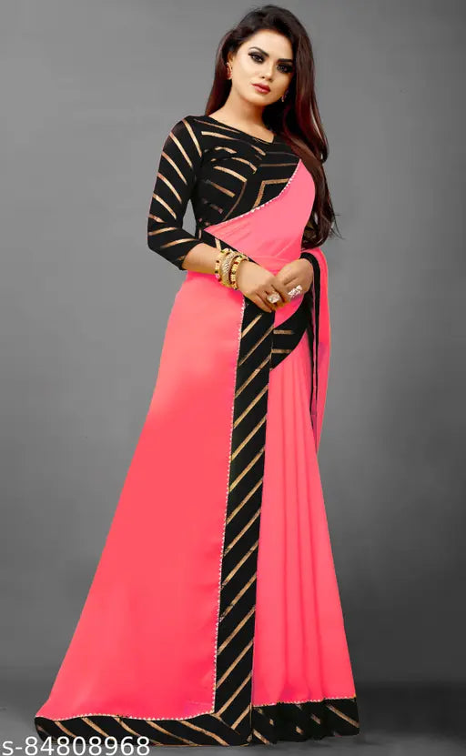 Black and white chevron pattern on pink fabric saree