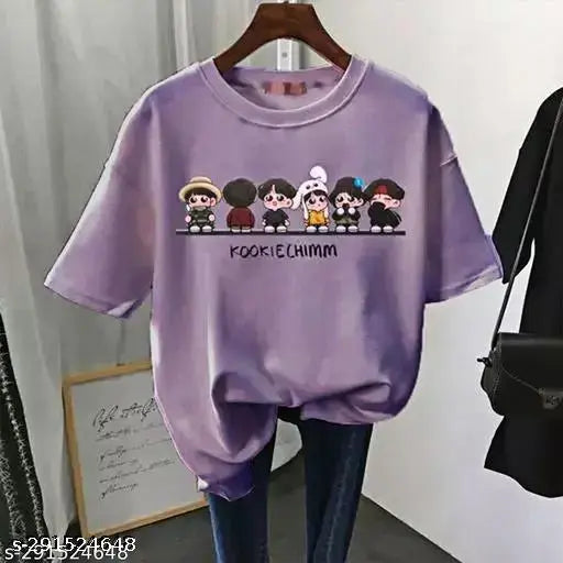 Purple oversized graphic t-shirt with BTS chibi characters, featuring seven cartoon figures with varying expressions and hairstyles