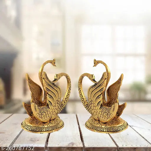 Decorative swan napkin holder duck set of 2, gold-finished oxidized metal for dining table and home decoration. Indian handicraft & artifact showpiece. Dimensions: 8.5cm(L) x 11cm(H) x 6.5cm(B), 2 pieces included