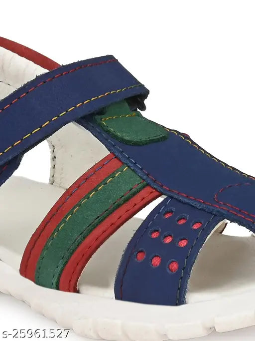 Blue leather boys sandals, PVC fastening, trendy floaters on grass