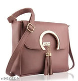 Purple patent leather handbag with gold faux chain accents, keyhole embellishment