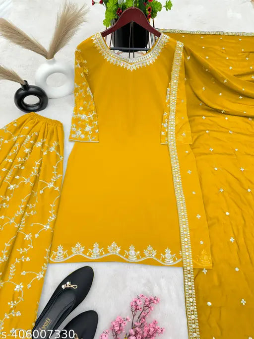 Yellow georgette salwar kameez with floral embroidery and matching dupatta