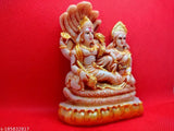 Yellow and red resin figurine of two deities