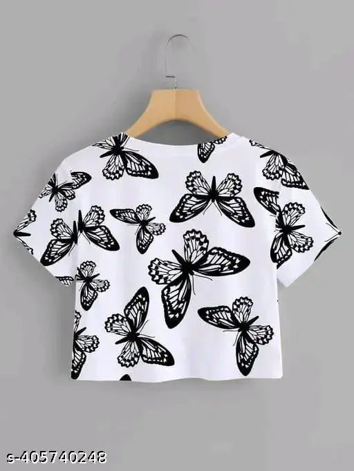 Trendy printed crop t-shirt, round neck top for women (polyester/lycra), available in sizes S-XL. Perfect for casual outfits like jeans, leggings, or shorts. Machine washable; wash inside out and dry in shade. Indian origin