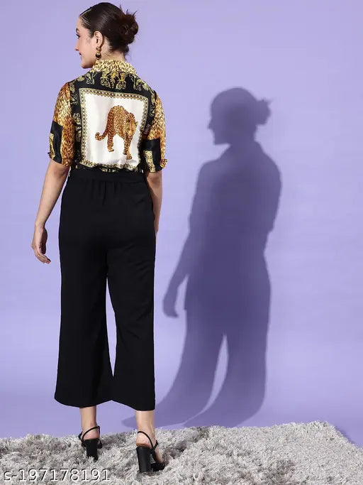 Yellow polyester jumpsuit with animal print collar, three-quarter sleeves, by StyleStone. Model wears XL