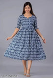 Blue geometric pattern on dress with sleeves and hem