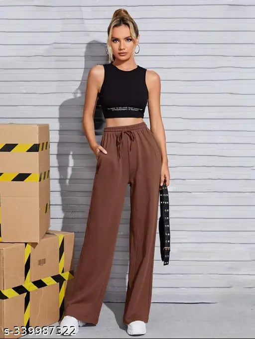 Brown pants, black cropped top
