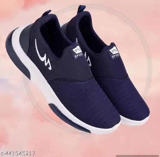 Navy blue lace up running shoes for boys, with a white brand logo
