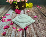 Off-white marble Lakshmi Charan Paduka for Puja, intricately designed and handcrafted Indian religious artifact (7x7cm)