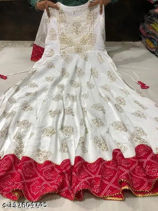 White rayon embroidered Anarkali Kurti with three-quarter sleeves, perfect for girls' festive wear. Features latest printed embroidery from India. Size: M (38in bust, 50in length), L (40in bust, 50in length), XL (42in bust, 50in length), XXL (44in bust, 50in length), XXXL, 4XL