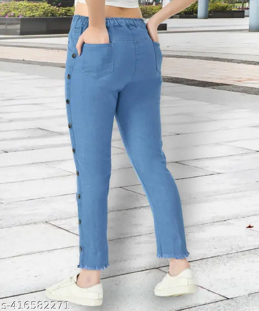 Light blue stretchable premium denim side buttoned jogger jeans with elastic waist and ankle cuffs, baggy style, plus size for women