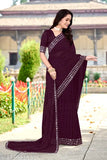 Purple silk saree with matching blouse, draped elegantly