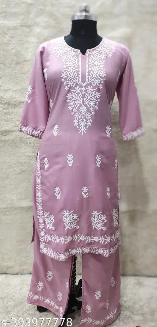 Embroidered rayon Chikankari work kurta with palazzos, three-quarter sleeves, and a single size M-6XL. Indian traditional women's outfit on display