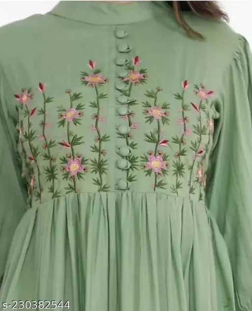 Classy Rayon Anarkali gown with intricate embroidery and 9 buttons, perfect for festivals and parties wear