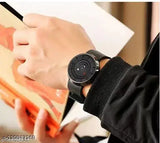 Black watch with silver accents, date function, and strap