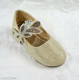 Stylish gold juttis with butterfly embellishments