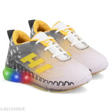 Black kids sneakers with white laces, LED lights on soles