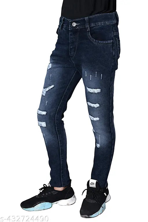 Black men's denim jeans with frayed hems and distressed knee details