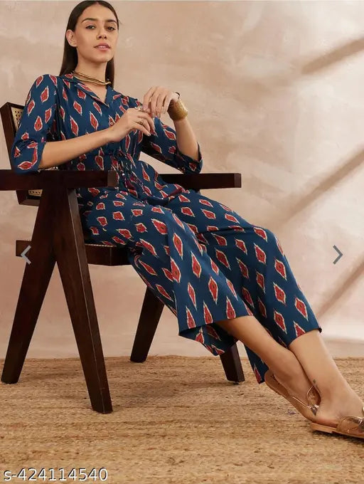 IKKAT blue rayon jumpsuit with short sleeves, printed pattern on a model