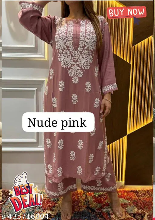 Rayon embroidered kurta set with palazzo pants, three-quarter sleeves, in sizes M, L, XL & XXXL. Indian workwear fashion on mannequin