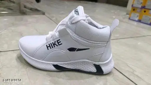 White sneakers with 'NIKE' logo, suitable for kids