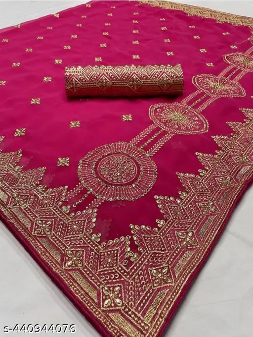 Red saree with intricate gold detailing on a patterned pallu, neatly folded and displayed