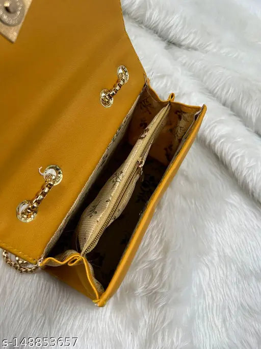 A gold leather sling bag with multiple compartments, zip closure