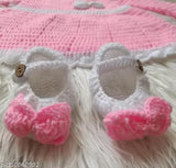 Handmade acrylic woolen baby girl frock/sweater with hairband cap and booties, solid pattern, three-quarter sleeves, 12-18 months size. Indian handcrafted winter wear for girls