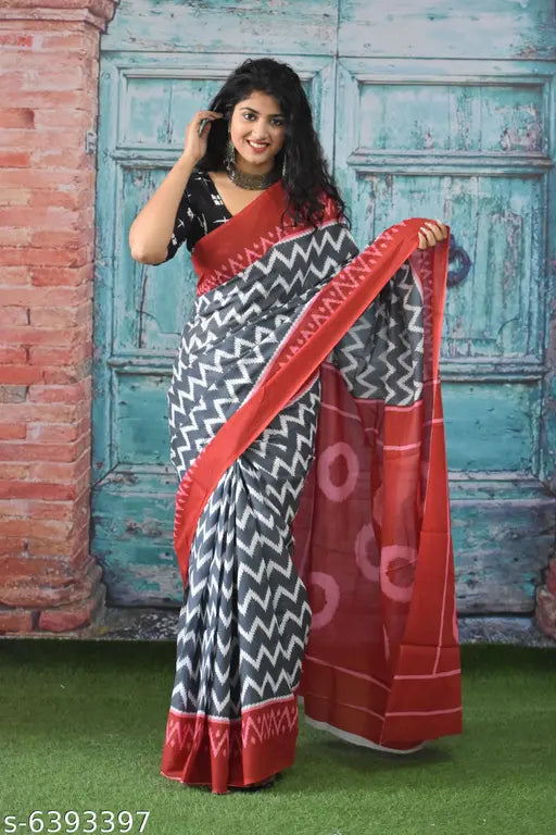 Stylish women's saree with black and white geometric pattern, red border