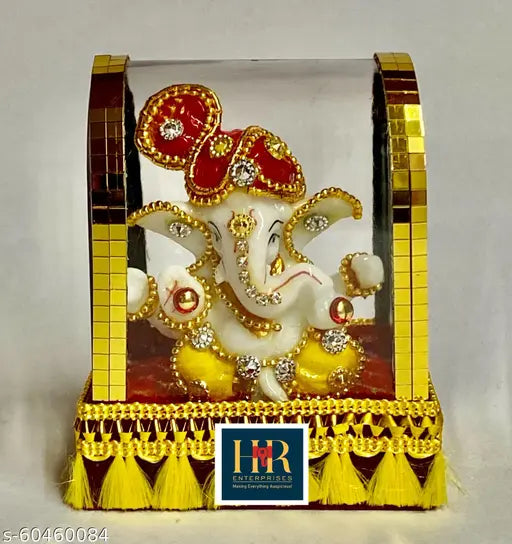 Multi-color polyresin handcrafted Ganesha idol for home decor, ideal for living room and car dashboards. Features antique showpiece design, perfect for gifting or housewarming