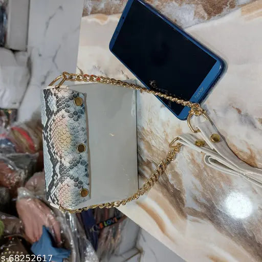 Slender snake skin clutch purse with gold chain detail