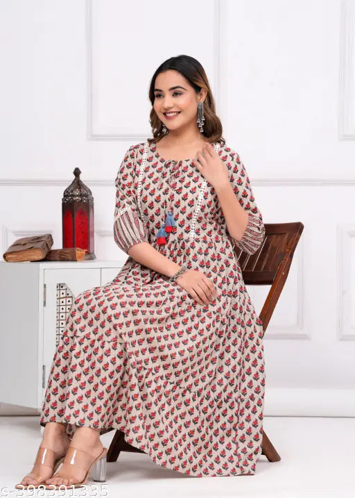 Beige cotton printed anarkali kameez with puffed sleeves, printed pattern on bodice and hem, straight cut, long length, fitted waist with elastic, round neckline