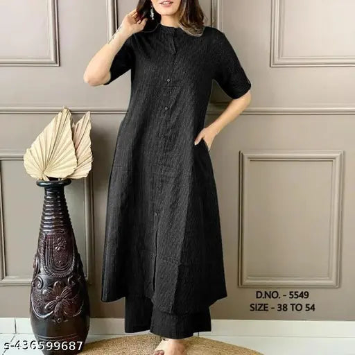 Women's black kurta palazzo set with long sleeves and a traditional fit