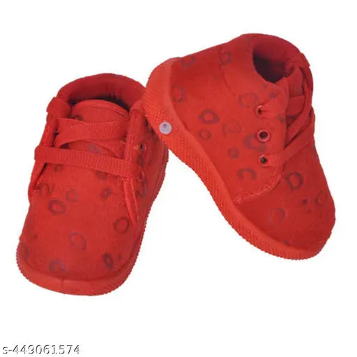 Red croc shoes with white soles