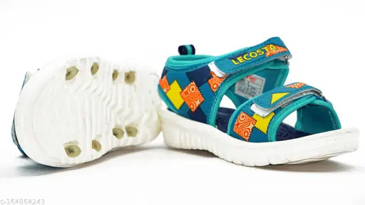The image depicts a pair of limited edition Lecosta sea green sandals, designed for boys aged 5 to 10 years. These sandals feature a colorful design and are crafted with comfort in mind. They are ideal footwear for warm weather or casual outings