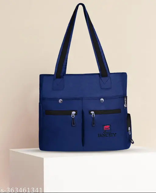 Blue fabric, black trim, zip closure, large shoulder bag, casual travel office party stylish
