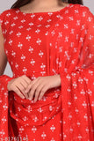 Red, lace, sleeveless blouse with a butterfly design on a saree