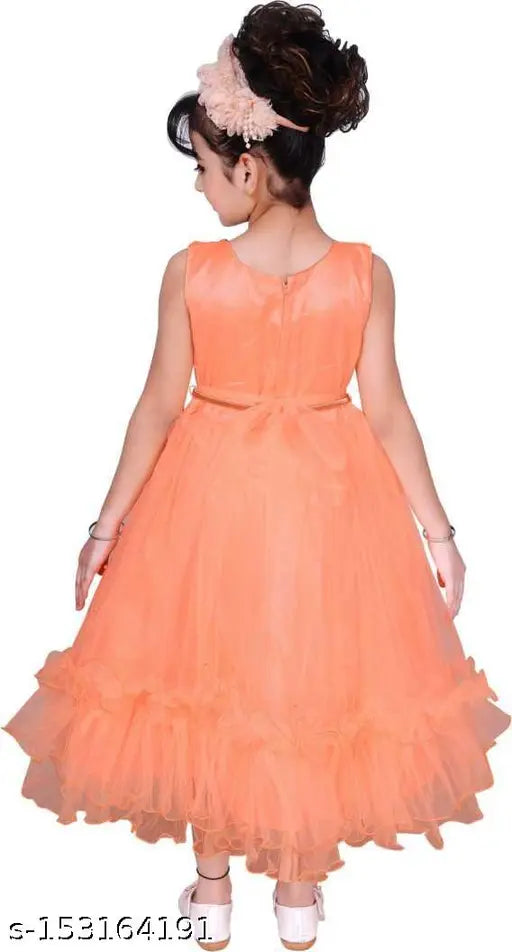 Trendy orange dress with ruffled skirt and lace trim