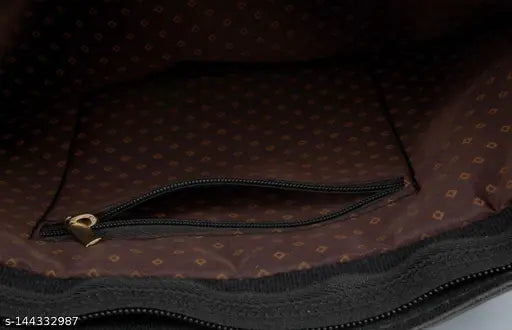 Brown leather sling bag with multiple pockets and a matching pouch