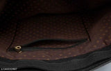 Brown leather sling bag with multiple pockets and a matching pouch