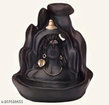 Black and Brown polyresin Shiv decor showpiece: Mahadev Adiyogi & Ganesha smoke fountain with incense cones, ideal for home or car decor