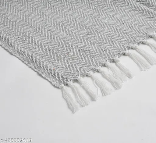 Grey and white herringbone cotton sofa throw